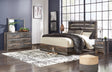 Furniture City Houma - Ashley Furniture - Drystan King Panel Bed, Dresser, Mirror, and Nightstand - King Panel Bed, Dresser, Mirror, and Nightstand - B211B59