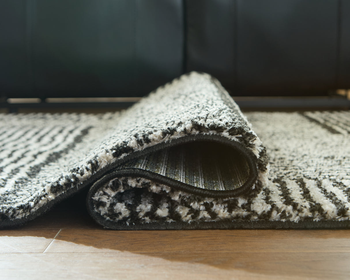 Kurtmen 7'10" x 9'10" Area Rug