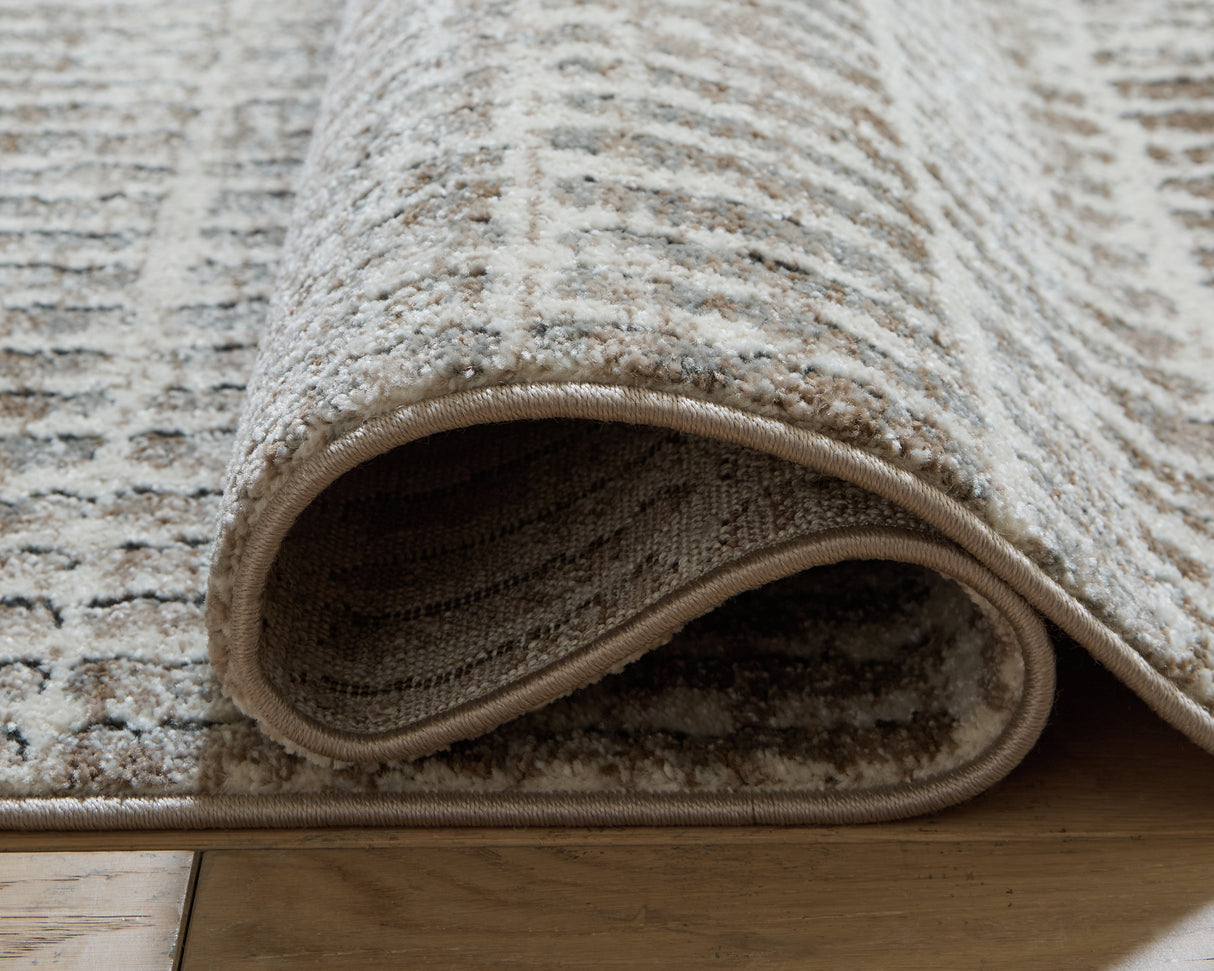 Fuadwick 7'10" x 10' Area Rug