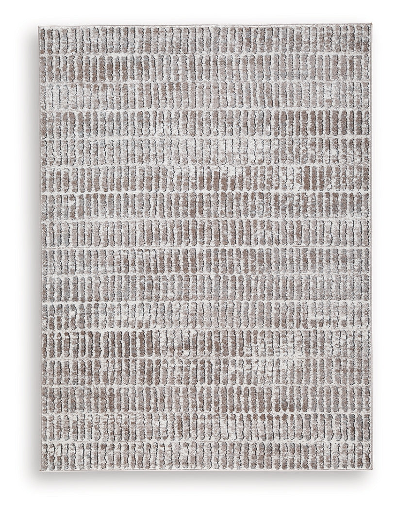 Fuadwick 5'3" x 7' Area Rug