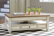 Furniture City Houma - Ashley Furniture - Realyn Coffee Table with Lift Top - Lift Top Cocktail Table - T523-9