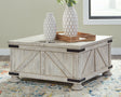 Furniture City Houma - Ashley Furniture - Carynhurst Coffee Table - Cocktail Table with Storage - T929-20