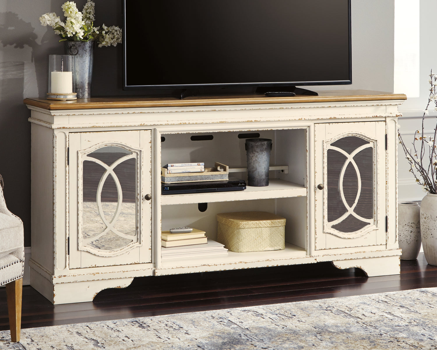Furniture City Houma - Ashley Furniture - Realyn 74" TV Stand - 74" - W743-68