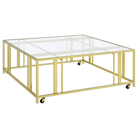 Furniture City Houma - Coaster - Adri Square Glass Top Coffee Table with Casters Matte Brass - 710188