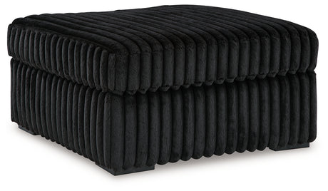 Midnight-Madness 2-Piece Sectional and Oversized Accent Ottoman