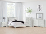 Zyniden Queen Upholstered Panel Bed