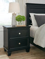 Furniture City Houma - Ashley Furniture - Lanolee Nightstand - Two Drawer Night Stand / Black - B687-92