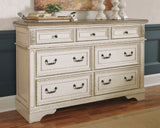 Realyn Queen Upholstered Panel Bed