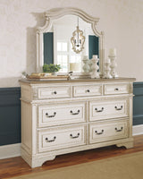 Realyn King Storage Bed, Dresser, Mirror and Nightstand