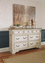 Realyn Queen Upholstered Panel Bed