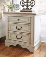 Realyn Queen Upholstered Panel Bed