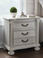 Furniture City Houma - Ashley Furniture - Montelaine Nightstand - Three Drawer Night Stand / Antique White - B795-93