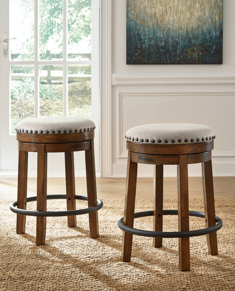 Furniture City Houma - Ashley Furniture - Valebeck Counter Height Stool - UPH Swivel Stool (1/CN) / Brown/Black - D546-124