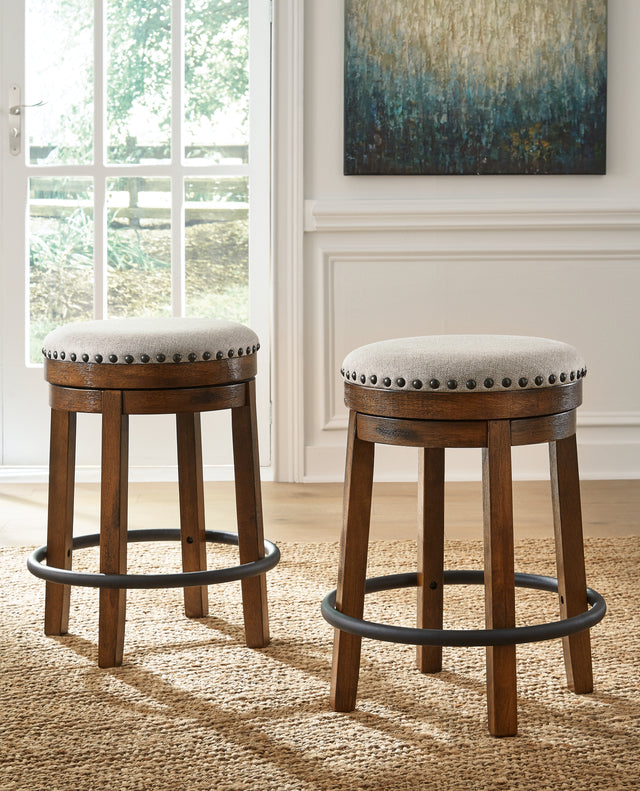 Furniture City Houma - Ashley Furniture - Valebeck Counter Height Stool - UPH Swivel Stool (1/CN) / Brown/Black - D546-124