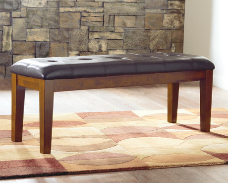 Furniture City Houma - Ashley Furniture - Ralene Dining Bench - Large UPH Dining Room Bench / Medium Brown / 50"W x 16"D x 19"H - D594-00