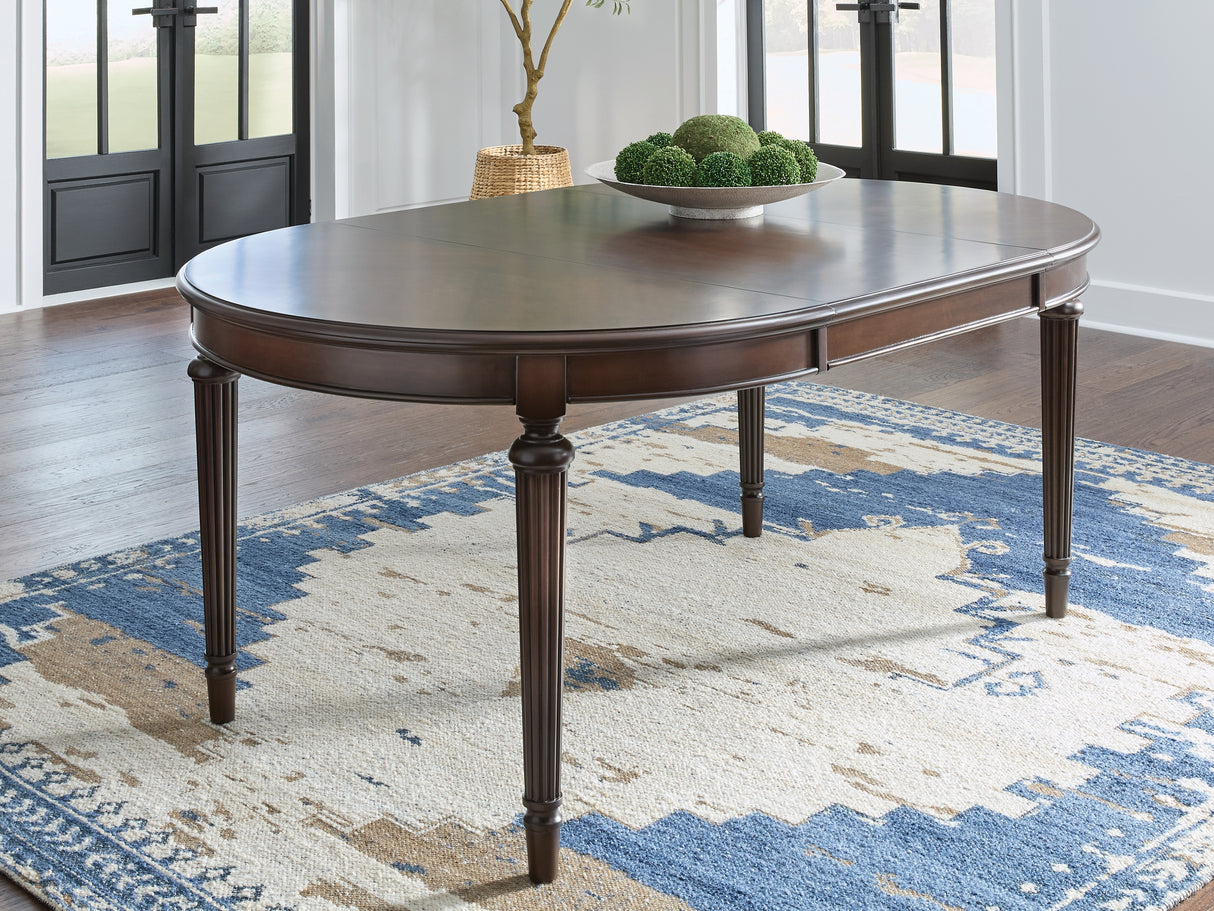 Furniture City Houma - Ashley Furniture - Lavinton Dining Room - Oval Dining Room EXT Table / Brown - D764-35