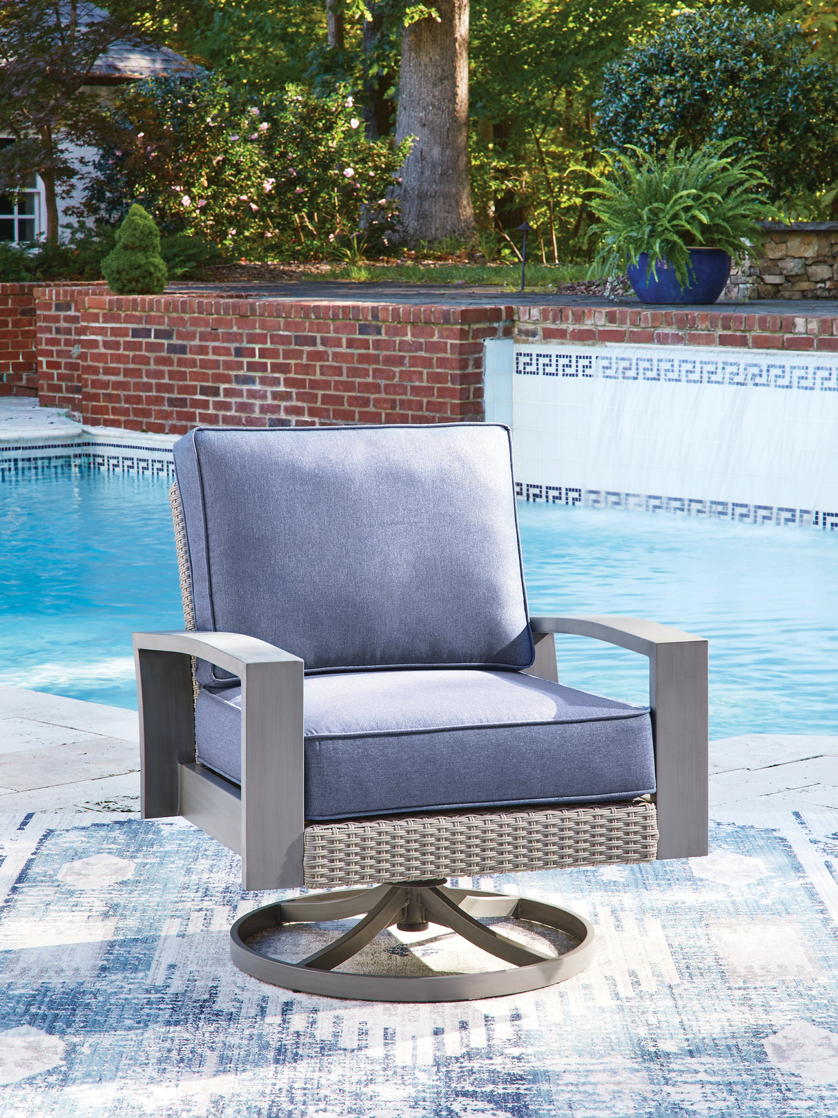 Furniture City Houma - Ashley Furniture - Half Moon Beach Outdoor Swivel Lounge Chair with Cushion - Swivel Lounge w/ Cushion - PCP418-821