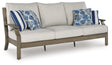 Furniture City Houma - Ashley Furniture - Rainier Ranch Outdoor Sofa with Cushion - Sofa with Cushion / Brown/Beige - P701-838