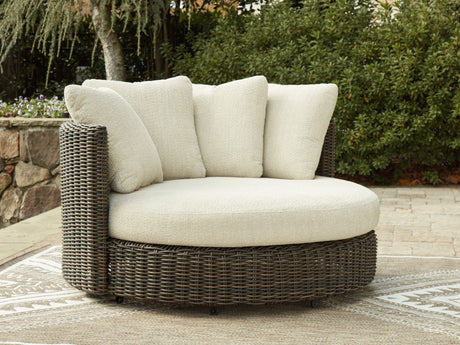 Furniture City Houma - Ashley Furniture - Kimora Outdoor Swivel Lounge Chair with Cushion - Swivel Lounge Chair w/Cushion / Beige/Dark Brown - P711-810