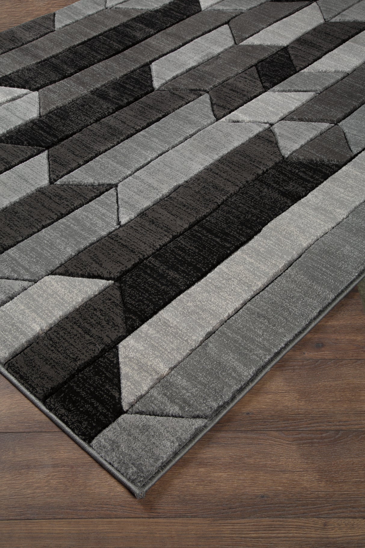 Furniture City Houma - Ashley Furniture - Chayse Rug - 6'6" x 9'6" Rug / Black/Gray - R403461