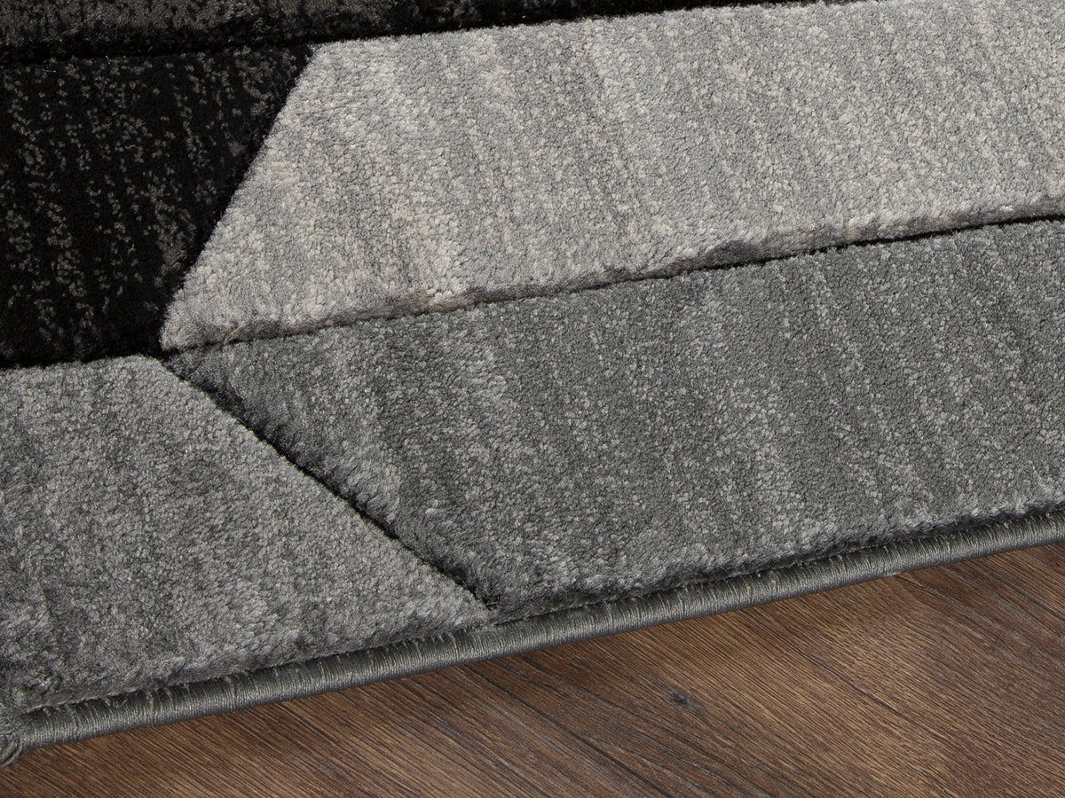 Furniture City Houma - Ashley Furniture - Chayse Rug - 5' x 6'7" Rug / Black/Gray - R403462