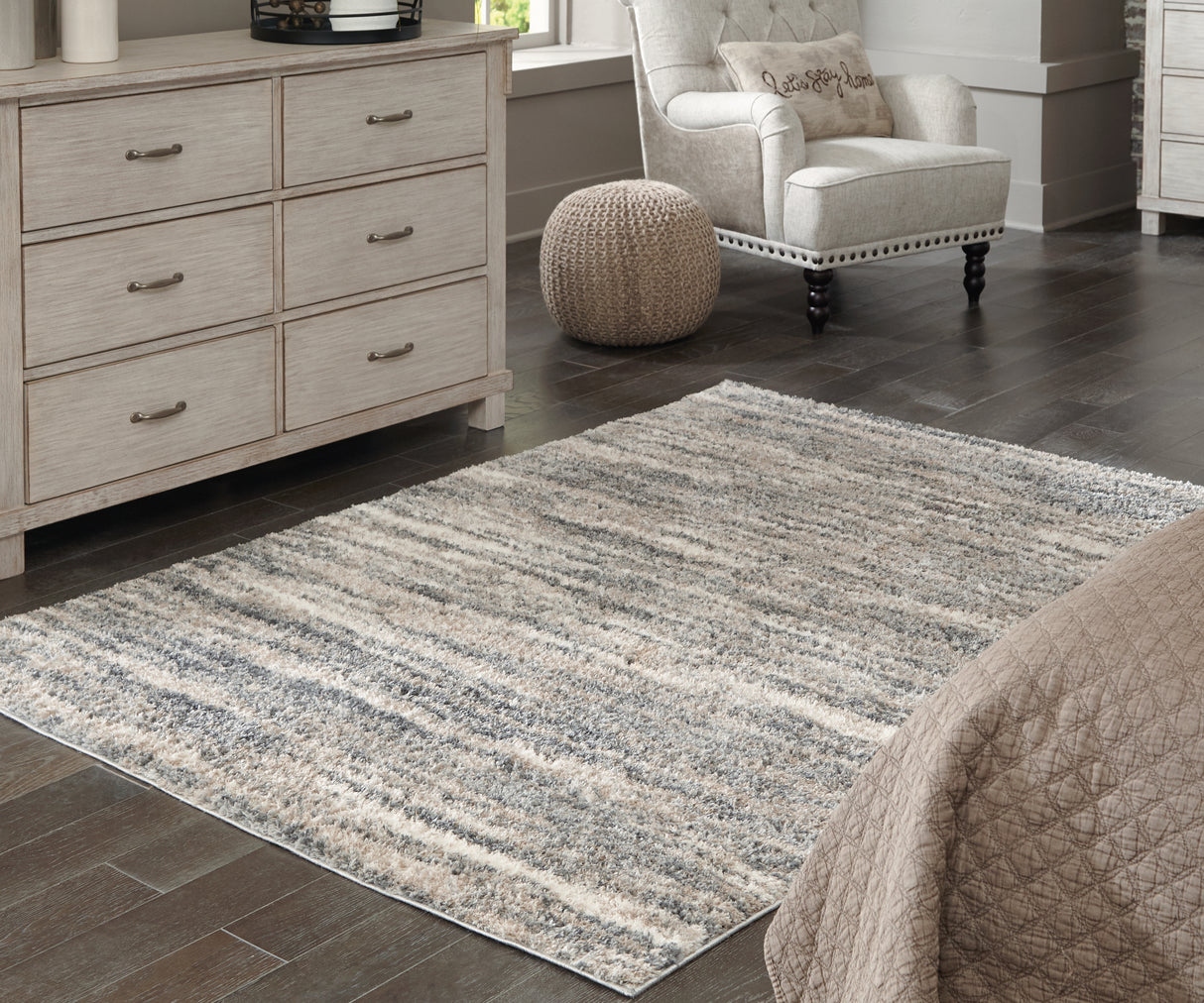 Furniture City Houma - Ashley Furniture - Gizela Rug - 7'10" x 10' Rug / Ivory/Beige/Gray - R404861