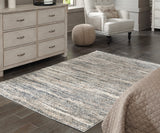 Furniture City Houma - Ashley Furniture - Gizela Rug - 7'10" x 10' Rug / Ivory/Beige/Gray - R404861