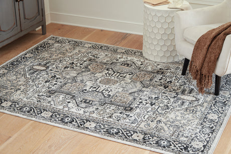 Furniture City Houma - Ashley Furniture - Gregmoore 5'2" x 6'10" Washable Rug - 5'2" x 6'10" Washable Rug / Multi - R405822