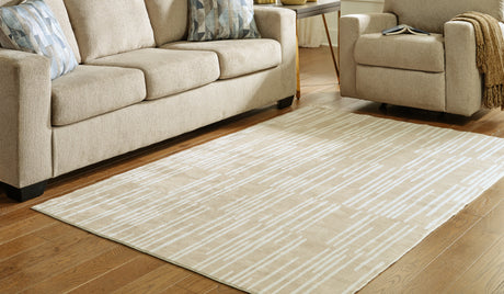 Furniture City Houma - Ashley Furniture - Ardenville Rug - 5' x 7'1" Washable Rug / Tan/Cream - R406212