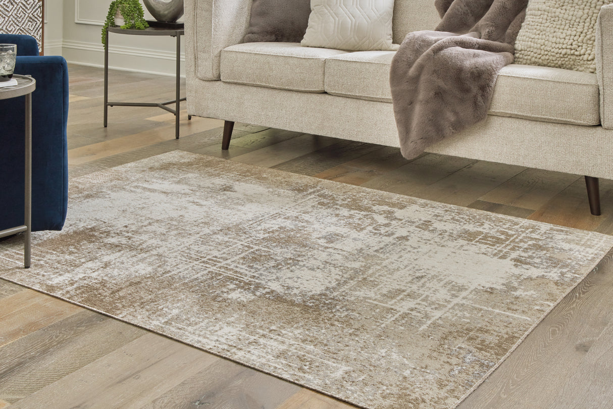 Furniture City Houma - Ashley Furniture - Grifflain Rug - 5'1" x 7' Washable Rug / Tan/Brown/Gray - R406232