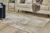 Furniture City Houma - Ashley Furniture - Grifflain Rug - 5'1" x 7' Washable Rug / Tan/Brown/Gray - R406232