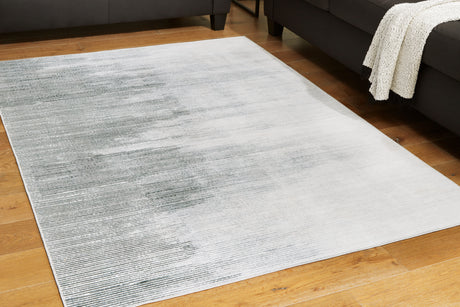 Furniture City Houma - Ashley Furniture - Milset Rug - 8'1" x 10' Washable Rug / Black/White/Gray - R406251