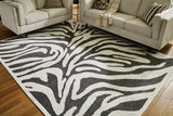 Furniture City Houma - Ashley Furniture - Thomwith Rug - 8' x 10'2" Washable Rug / Black/Ivory - R406291