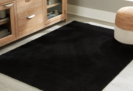 Furniture City Houma - Ashley Furniture - Anaben Rug - 5' x 7' Washable Rug / Black - R406312