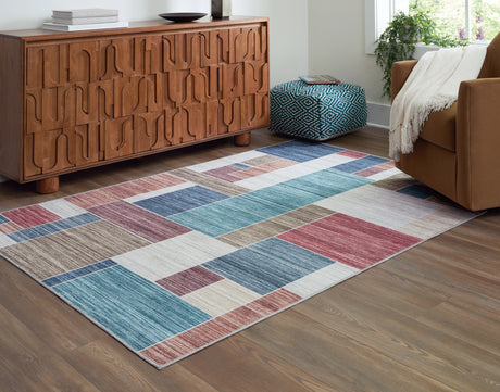 Furniture City Houma - Ashley Furniture - Numore Rug - 5'2" x 6'11" Washable Rug / Multi - R406662