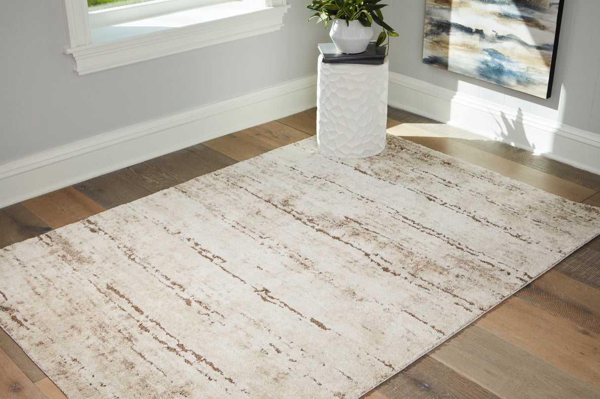 Furniture City Houma - Ashley Furniture - Kasney Rug - 5' x 7' Rug / Cream/Brown - R406852