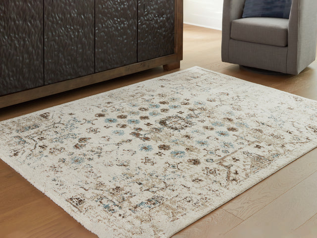 Furniture City Houma - Ashley Furniture - Jossler 5' x 7' Rug - 5' x 7' Rug / Ivory/Brown/Teal - R407072