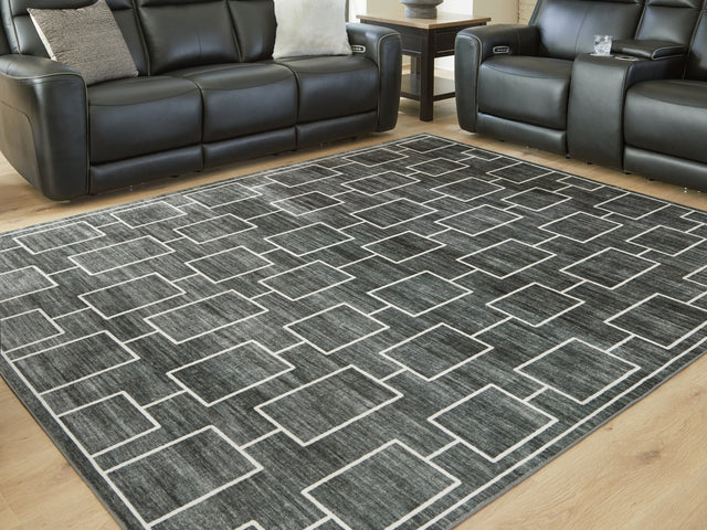 Furniture City Houma - Ashley Furniture - Elderland Washable 7'6" x 9'6" Area Rug - Washable 7'6" x 9'6" Area Rug / Black/Gray - R407401