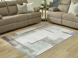 Furniture City Houma - Ashley Furniture - Larkport Washable 5' x 7' Area Rug - Washable 5' x 7' Area Rug / Cream/Brown/Gray - R407412