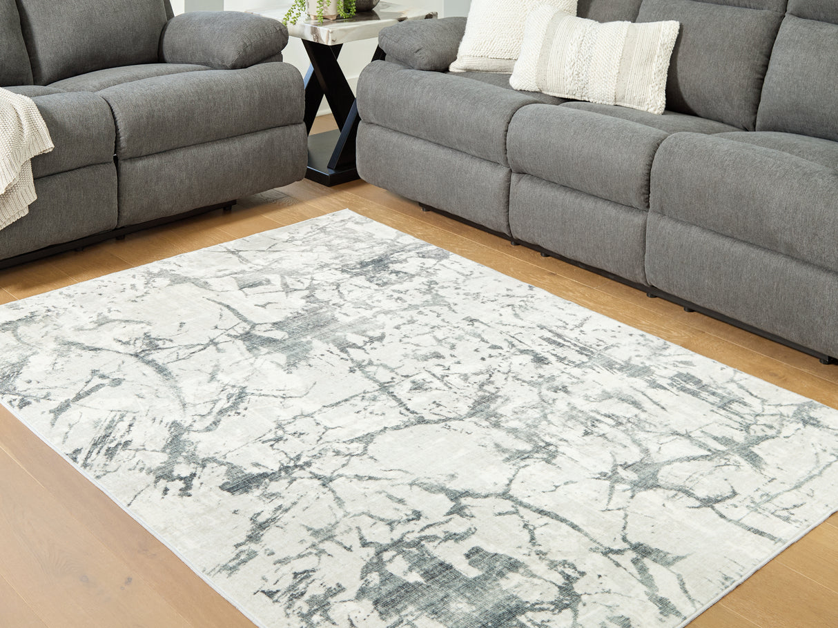 Furniture City Houma - Ashley Furniture - Tobinbury Rug - Washable 5' x 7' Area Rug / Gray - R407422
