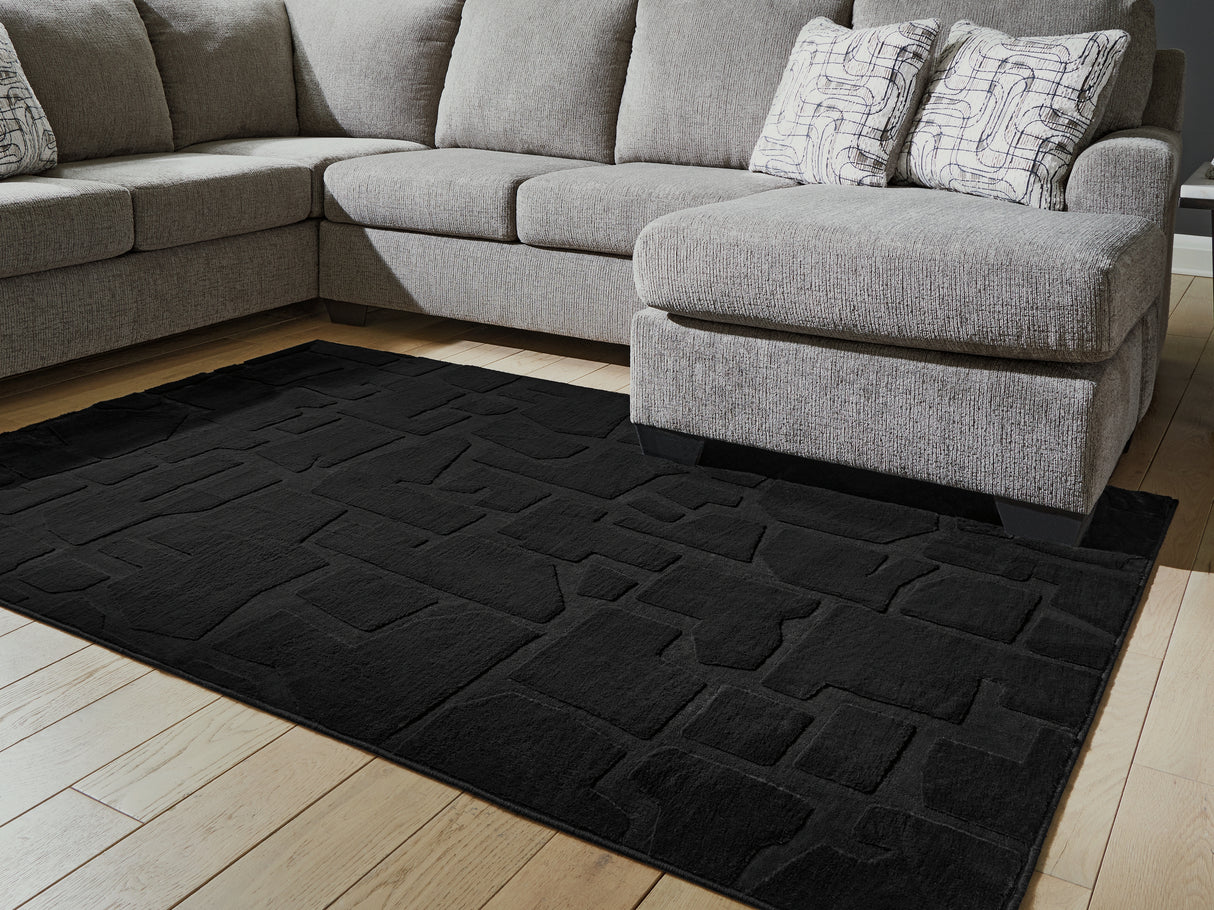 Furniture City Houma - Ashley Furniture - Gibbswell Washable 5' x 7' Area Rug - Washable 5' x 7' Area Rug / Black - R407462