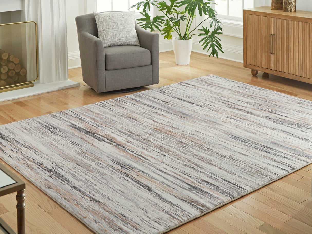 Furniture City Houma - Ashley Furniture - Nace Rug - 7'6" x 9'6" Area Rug / Gray/Brown/White - R407471