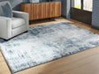 Furniture City Houma - Ashley Furniture - Arlenmont 7'6" x 9'6" Area Rug - 7'6" x 9'6" Area Rug / Blue/White/Brown - R407481