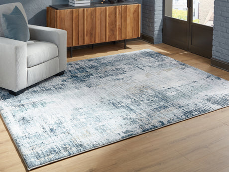 Furniture City Houma - Ashley Furniture - Arlenmont 7'6" x 9'6" Area Rug - 7'6" x 9'6" Area Rug / Blue/White/Brown - R407481
