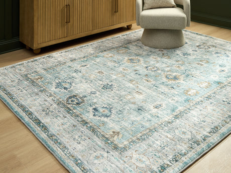 Furniture City Houma - Ashley Furniture - Ladstoney 7'6" x 9'6" Area Rug - 7'6" x 9'6" Area Rug / Teal/Beige/Ochre - R407501