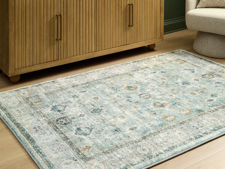 Furniture City Houma - Ashley Furniture - Ladstoney 5' x 7' Area Rug - 5' x 7' Area Rug / Teal/Beige/Ochre - R407502