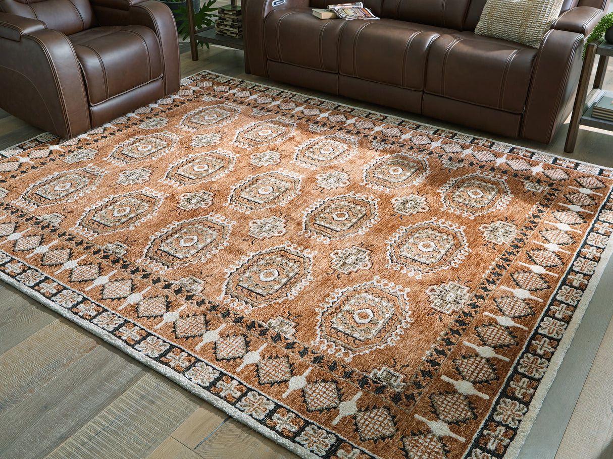 Furniture City Houma - Ashley Furniture - Qaabiz Rug - 7'8" x 10' Area Rug / Sienna/Ivory/Black - R407521