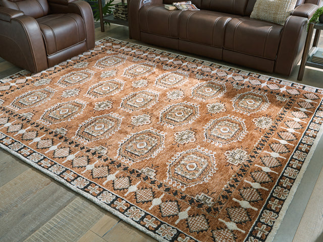 Furniture City Houma - Ashley Furniture - Qaabiz 7'8" x 10' Area Rug - 7'8" x 10' Area Rug / Sienna/Ivory/Black - R407521