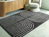 Furniture City Houma - Ashley Furniture - Eldonmore Rug - 5' x 7' Area Rug / Black/Ivory - R407572