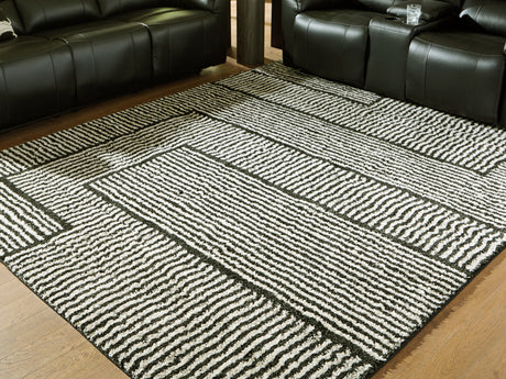 Furniture City Houma - Ashley Furniture - Kurtmen Rug - 5' x 7' Area Rug / Black/Ivory - R407592
